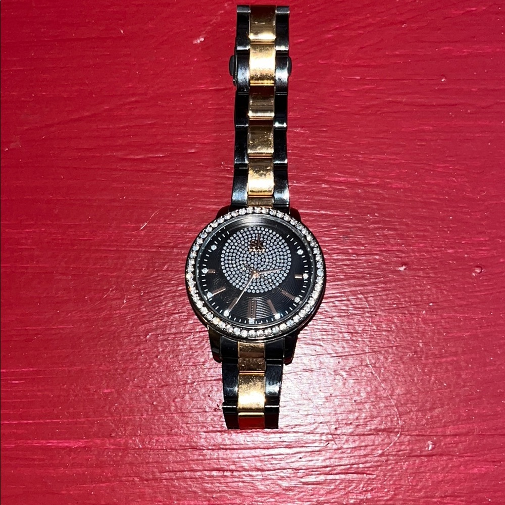 Black and Gold Watch with Crystal Details